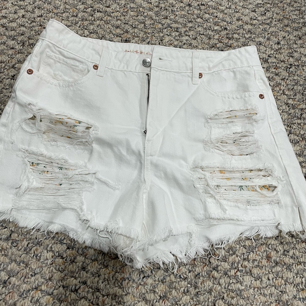 Brand new AE Mom shorts, with cut floral pattern under pockets. Size US 10